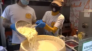 ITALIAN PASTA IN A CHEESE WHEEL, FRESH HANDMADE ITALIAN PASTA ROLLED IN PARMESAN CHEESE WHEEL