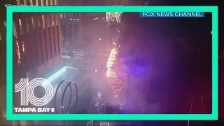 Man sets 50-foot Christmas tree outside of Fox News building on fire, police say