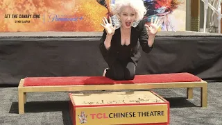 Cyndi Lauper makes her mark outside Hollywood's famed Chinese Theatre