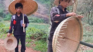 An orphan weaves an umbrella from bamboo