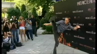 Van Damme kicking for the press with Lundgren and Statham [EX2 promo]