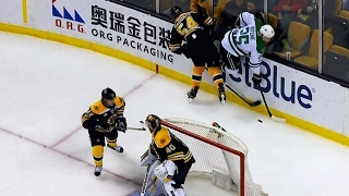 Rask, Krug help guide McQuaid off ice after injury