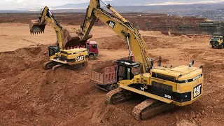 Caterpillar 365C Excavators Loading Mercedes And MAN Trucks