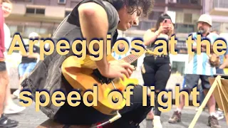 Arpeggios at the speed of light - Awesome street guitar performance