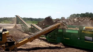McCloskey 628RE Trommel into 2 X ST80T Track Stackers
