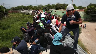 Migrants in Mexico boarding risky train north