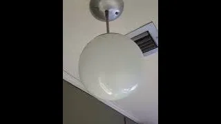 How to change the bulb in a Progress pendulum globe light fixture