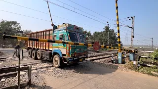 Dangerous Situation Truck Stucking on railgate : Speedy Intercity Express Furiously moving Railroad