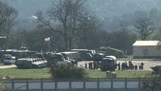 Russian forces tighten grip on Perevalne military base in Crimea