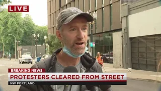 Mayor Ted Wheeler speaks after protesters spend the night outside his Pearl District home