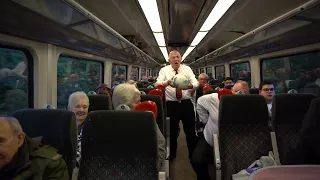 Flash mob Welsh choir singing on TfW train for World Cup