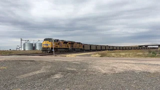 A train load of Powder River coal is accelerated eastward from a standstill. Hershey, NE 9-29-17