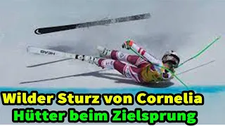 Wilder Sturz von Cornelia Hütter beim Zielsprung.