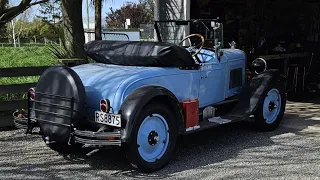 Driving a 1928 Chevrolet roadster.