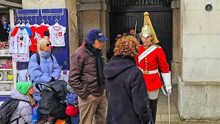 MOVE IDIOT! DISRESPECTFUL RUDE TOURIST thinks she's at Disneyland and not at Horse Guards!