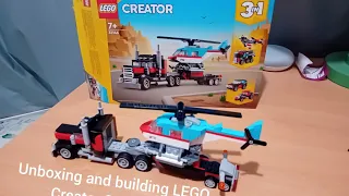 Unboxing and building LEGO Creator 3-in-1 Flatbed Truck with Helicopter! Part 1