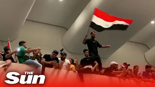 Iraqi protesters storm parliament and chant curses against Iran