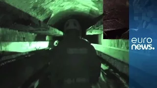 Police footage: Naples jewelry thieves' underground tunnel network