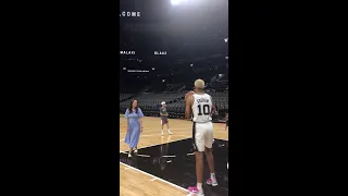Jeremy Sochan and his mother Aneta shooting basketball together at Spurs workout