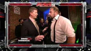 Raw - Triple H is escorted from the arena by Mexican officials