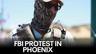 Armed Trump supporters protest outside of FBI office in Phoenix following Mar-a-Lago probe