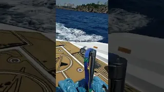 Passing through the cliffs of Antalya with our Parasailing boat  | Water Sports Antalya