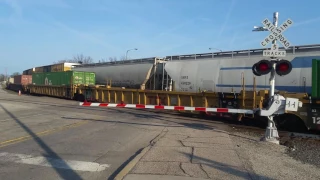 Westbound CP manifest meets a eastbound single NS  manifest at main st in Elkhart, IN