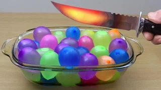 EXPERIMENT Glowing 1000 degree KNIFE vs WATER BALLOONS