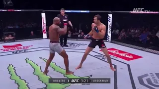 Yoel Romero blows out a candle