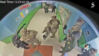 Video shows police milling in hallway during Uvalde school shooting