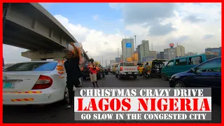 Crazy bike ride in the go-slow Of Lagos Nigeria - transport issues in the congested Nigerian city