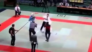 Martial arts ref goes bananas and floors both fighters
