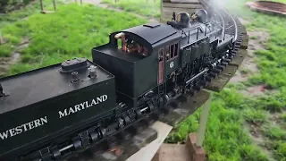 Aster WM Shay with empty log train