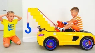 Vlad y Nikita juegan con Toy Tow Truck para niños