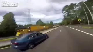 Racing car flips over because girlfriend pulls the handbrake!