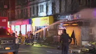 4 dead after fire in e-bike shop spreads to apartments in New York City