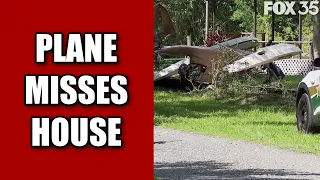 Plane crashes in Florida neighborhood, narrowly misses house