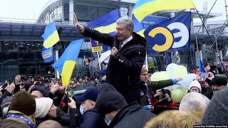 Defiant Ex-President Poroshenko Returns To Ukraine To Face Treason Charges