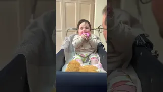 Julie shows Daddy her toys