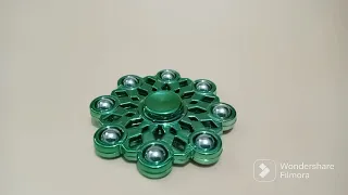 Eight Sided Metal Spinner Green Color With Balls Design - 1