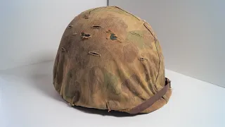 World War Two U.S. M1 Helmet With Second Pattern U.S.M.C. Camouflaged Cover.