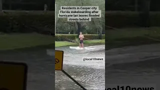 South Florida residents wakeboarding on flooded streets after hurricane Ian￼