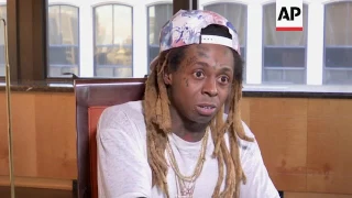 Lil Wayne stands by his 'no such thing as racism' comment.