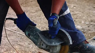 Cutting metal with a Makita angle grinder | 4K