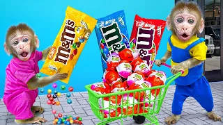 KiKi Monkey has trouble when he go shopping M&M Candy and Kinder Joy Eggs | KUDO ANIMAL KIKI