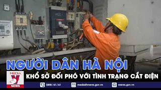 Người dân Hà Nội khổ sở đối phó với tình trạng cắt điện - VNEWS