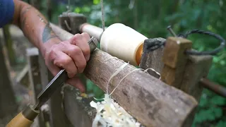 turning and carving a wooden cup