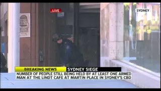 Two more hostages escape Sydney cafe siege