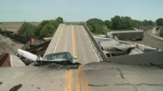 Train crash triggers highway overpass collapse in Missouri