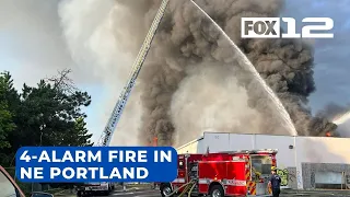 Crews respond to 4-alarm fire at old Kmart building in NE Portland